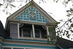 Balcony under the front dormer of 3101 Second Ave. S., the Dr. Rufus F. Lane House.