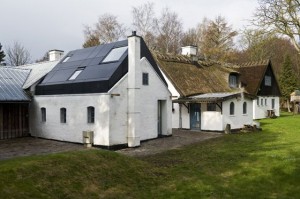 Old farm buildings converted to senior housing in the Netherlands.