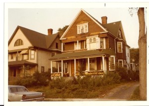 The J.B.Hudson House with the asbestos siding being removed. 1978.